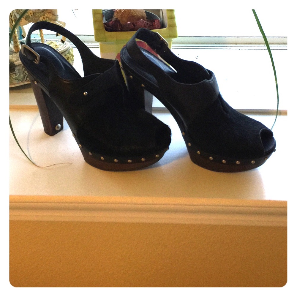 Ugg black platform calf hair shoes.